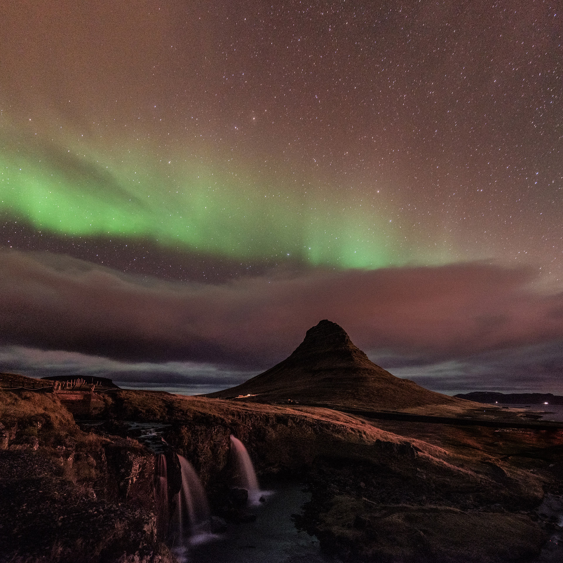 kirkufell mountain waterfall northern lights