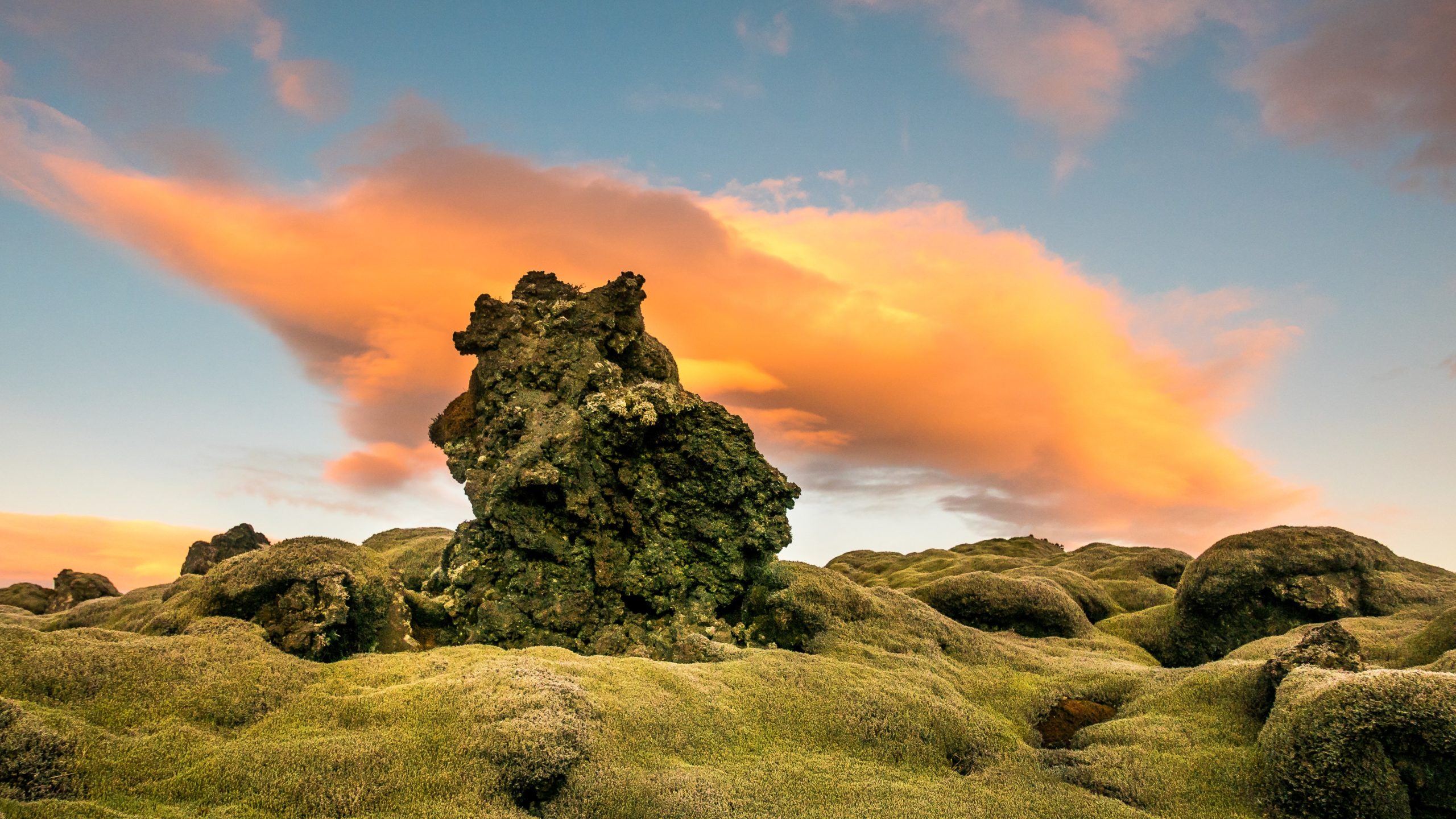 The Midnight Sun over a lava field in Iceland