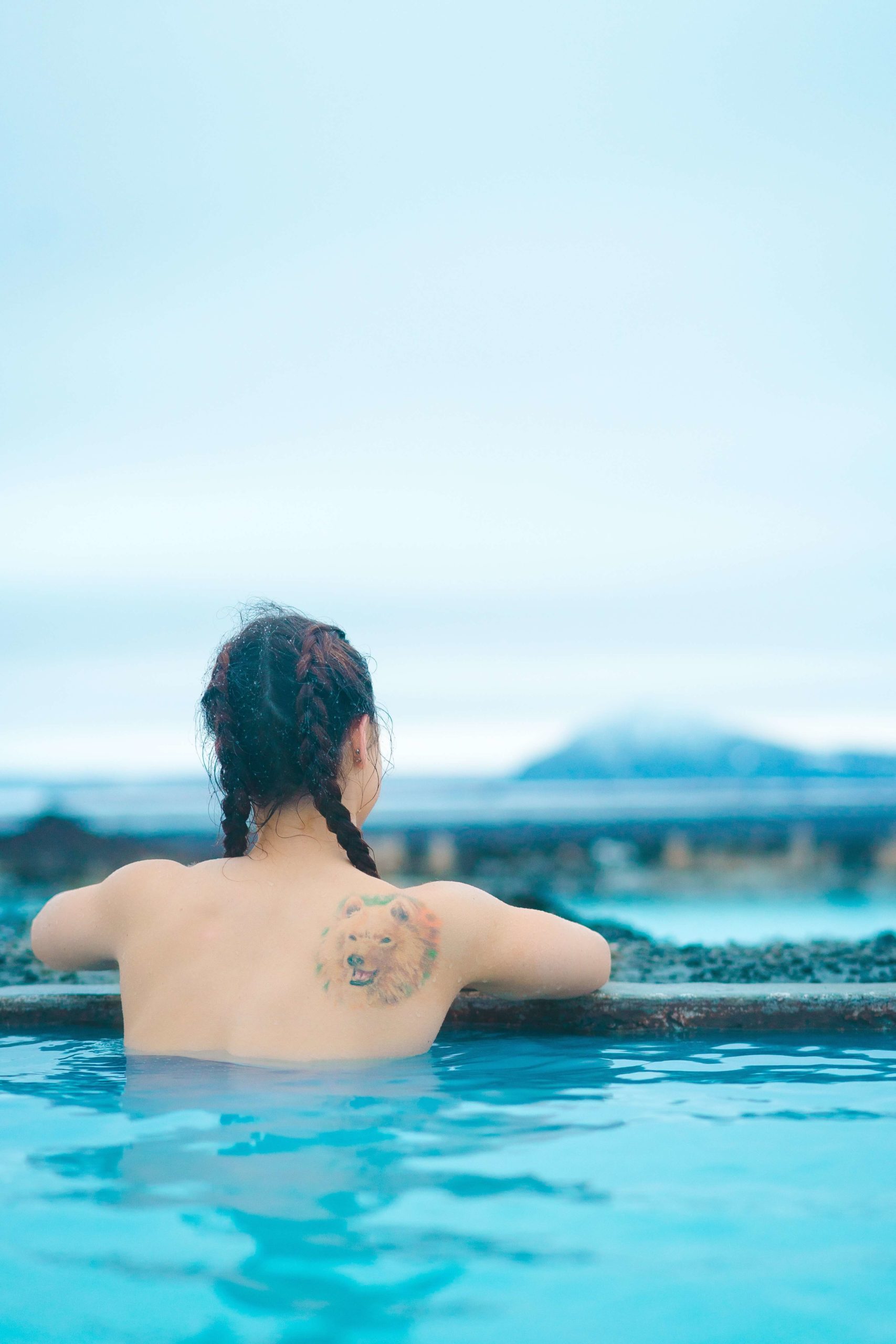 Woman bathing in a natural hot spring